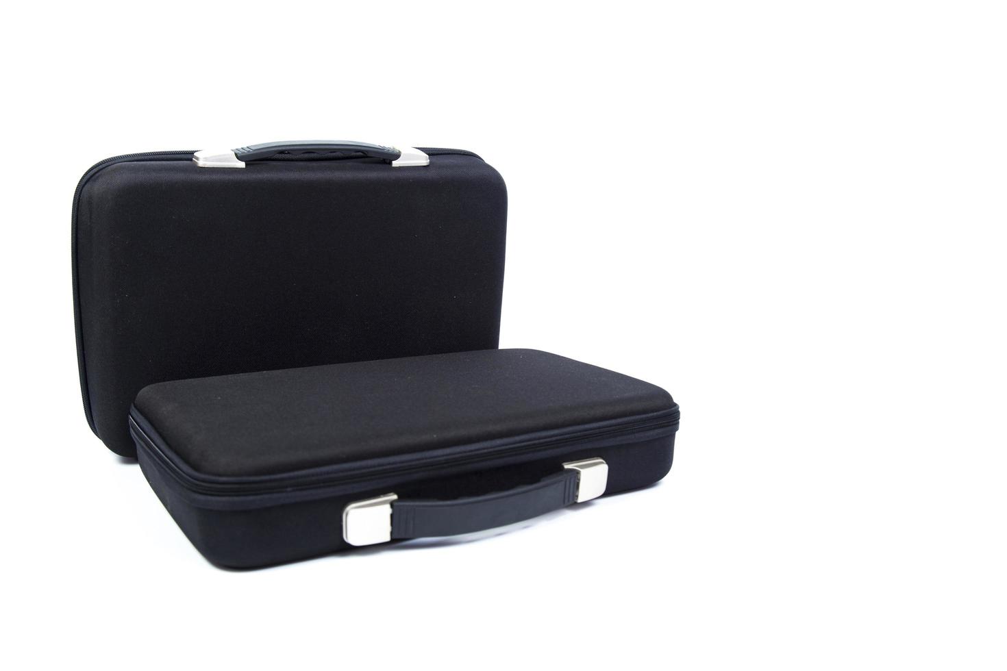 Two black briefcases on white background photo