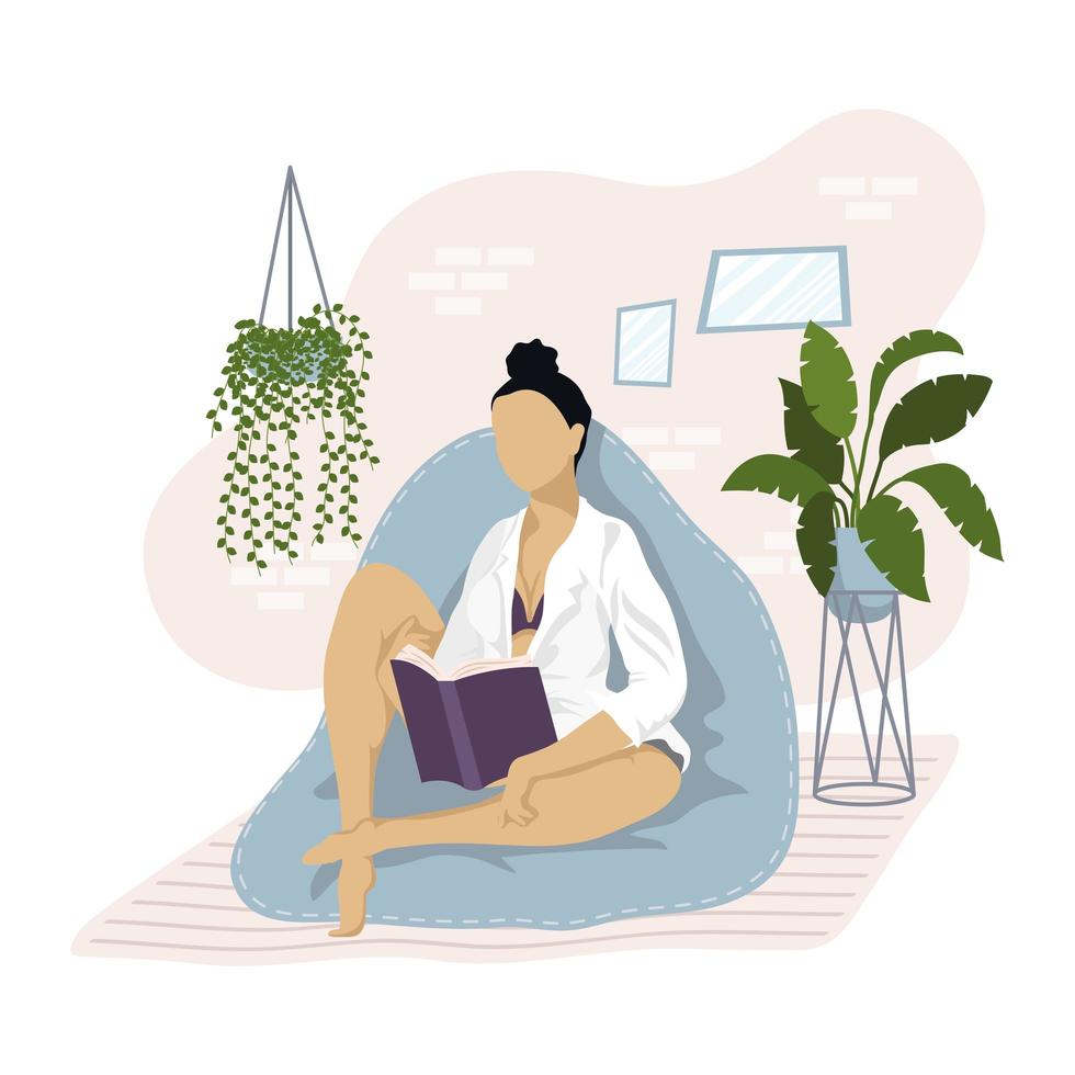 young woman reading book on the sofa vector