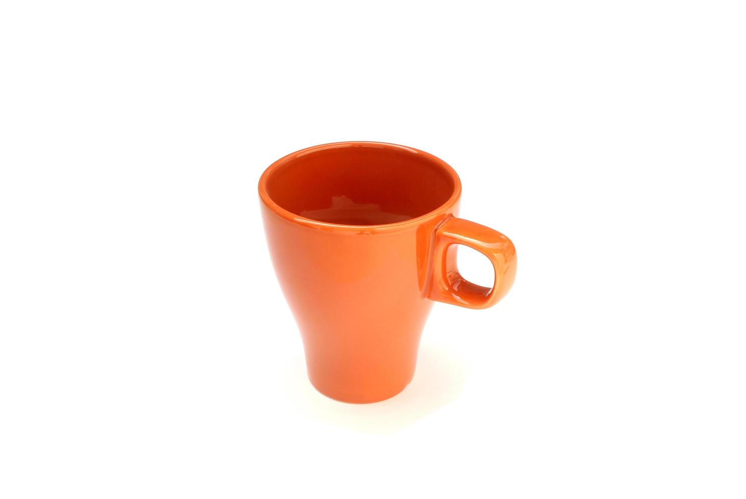 taza naranja aislada foto