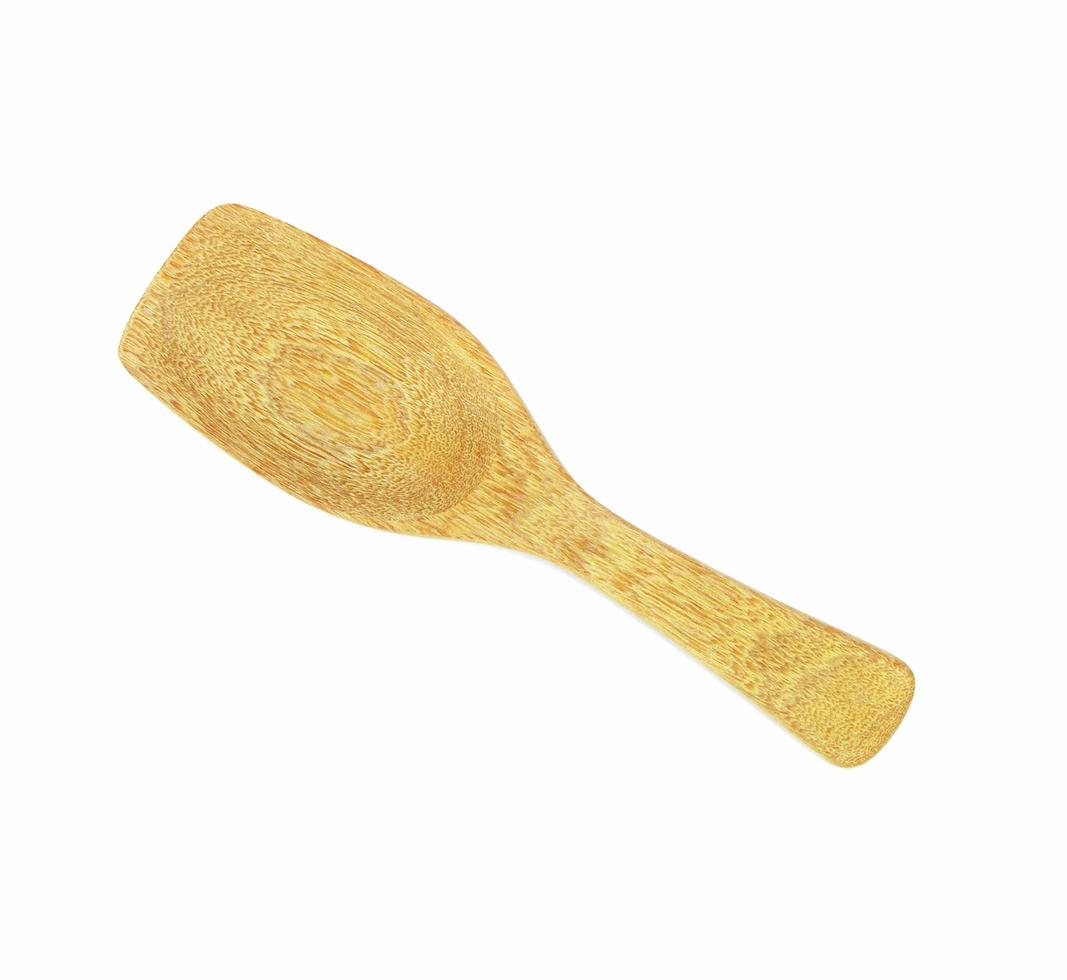 Wood scoop on white photo