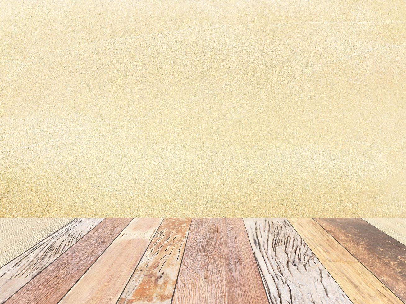 Wood table against beige background photo