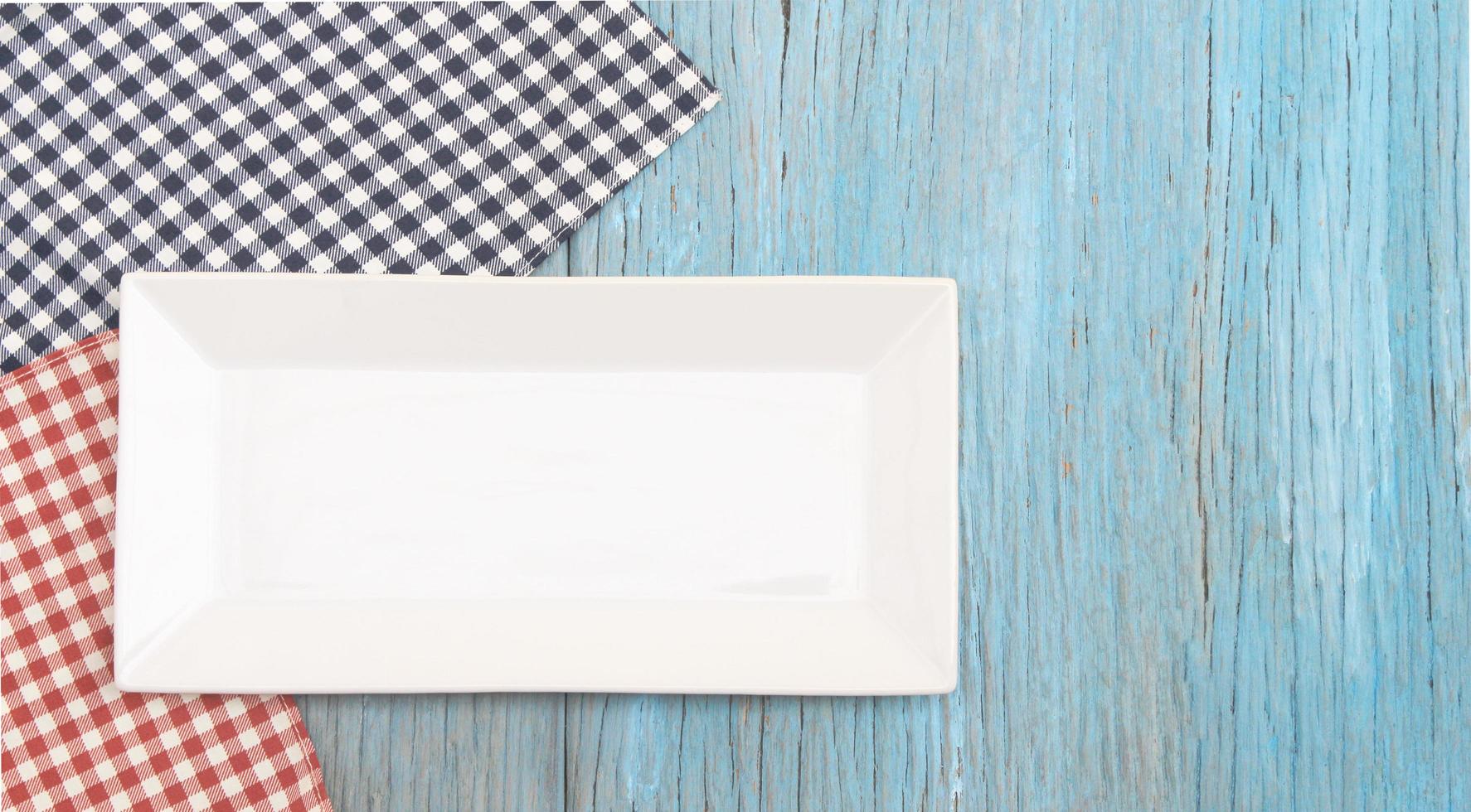 White tray on blue table photo