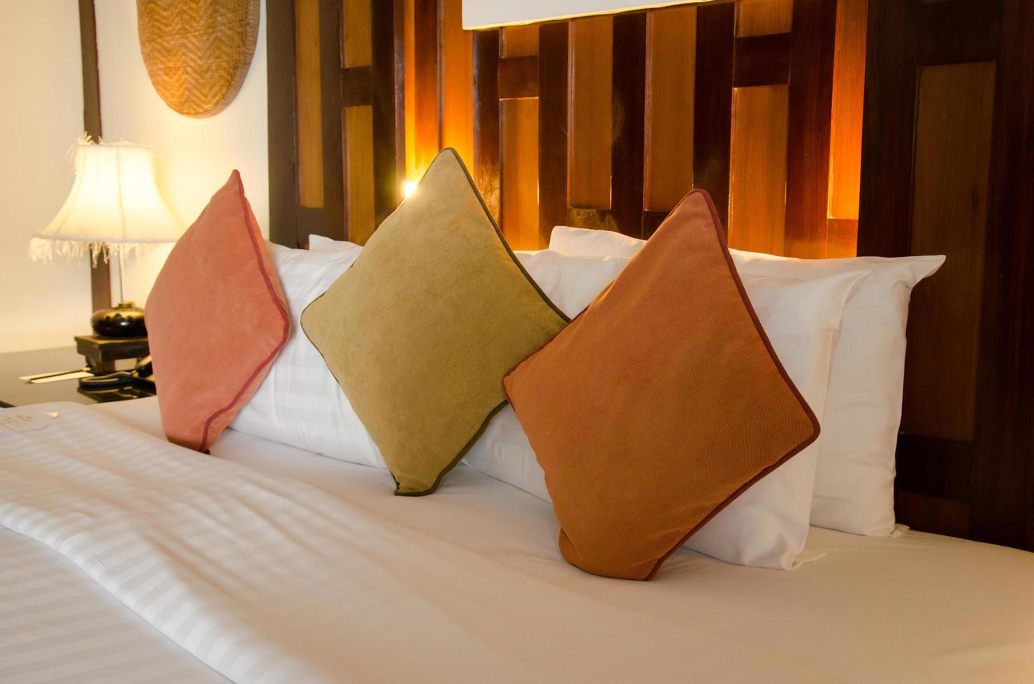 Pillows on luxury hotel bed photo