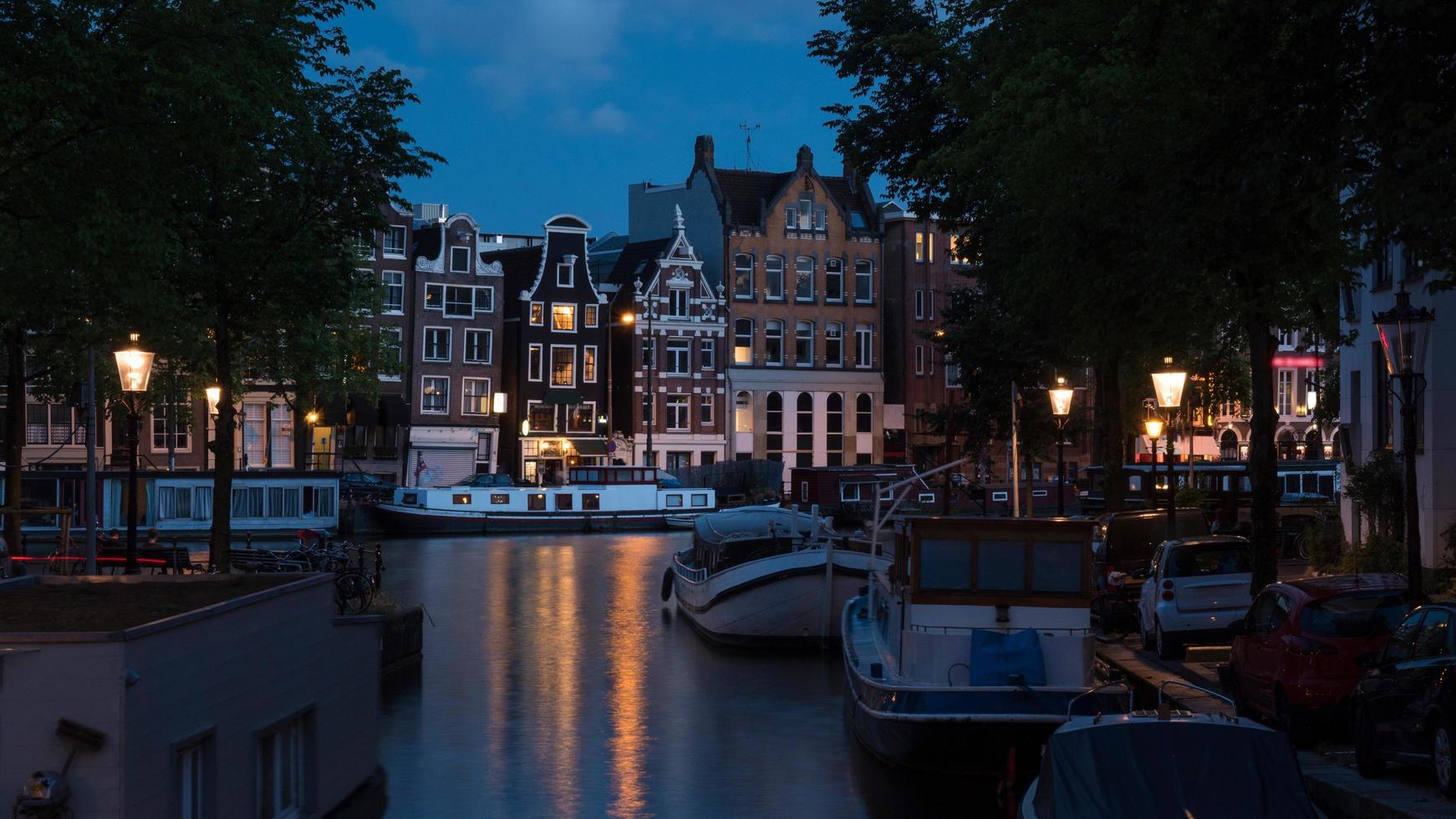 Amsterdam, Netherlands, 2020 - Amsterdam canal at night photo