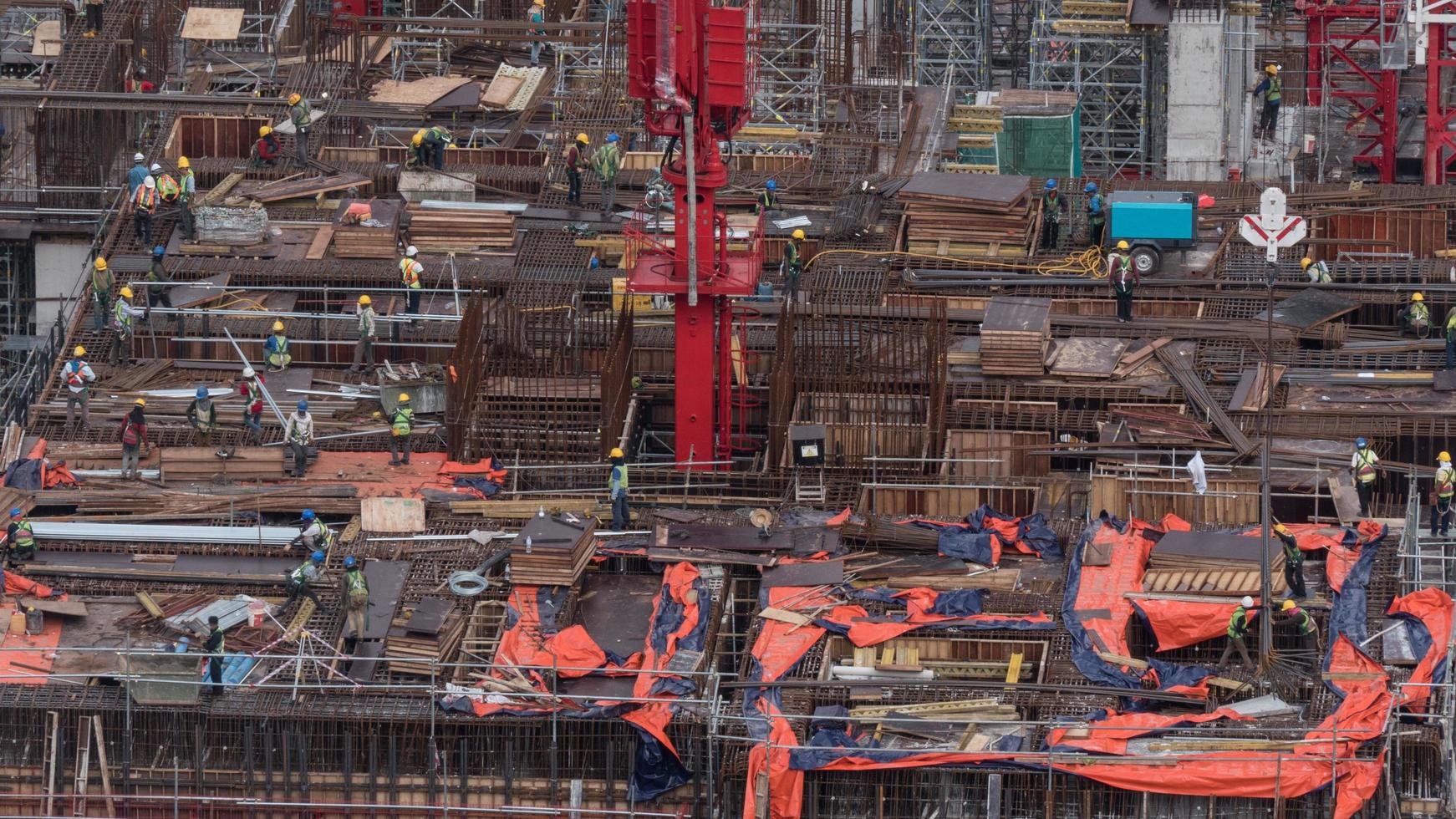 Kuala Lumpur, Malaysia, 2020 - People on a construction site photo