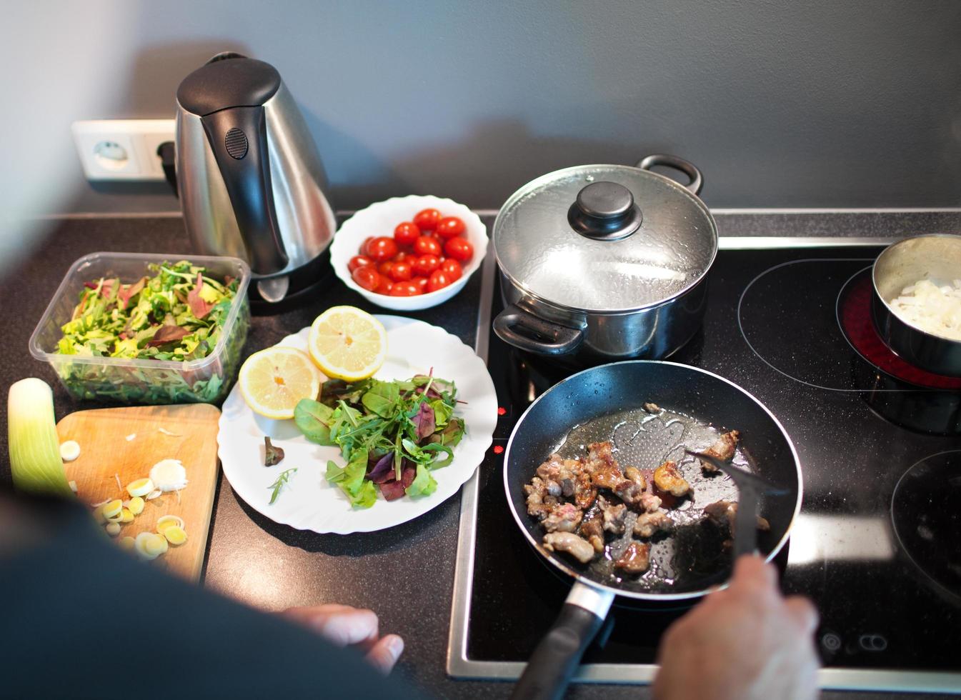 Cooking tasty family dinner at home photo