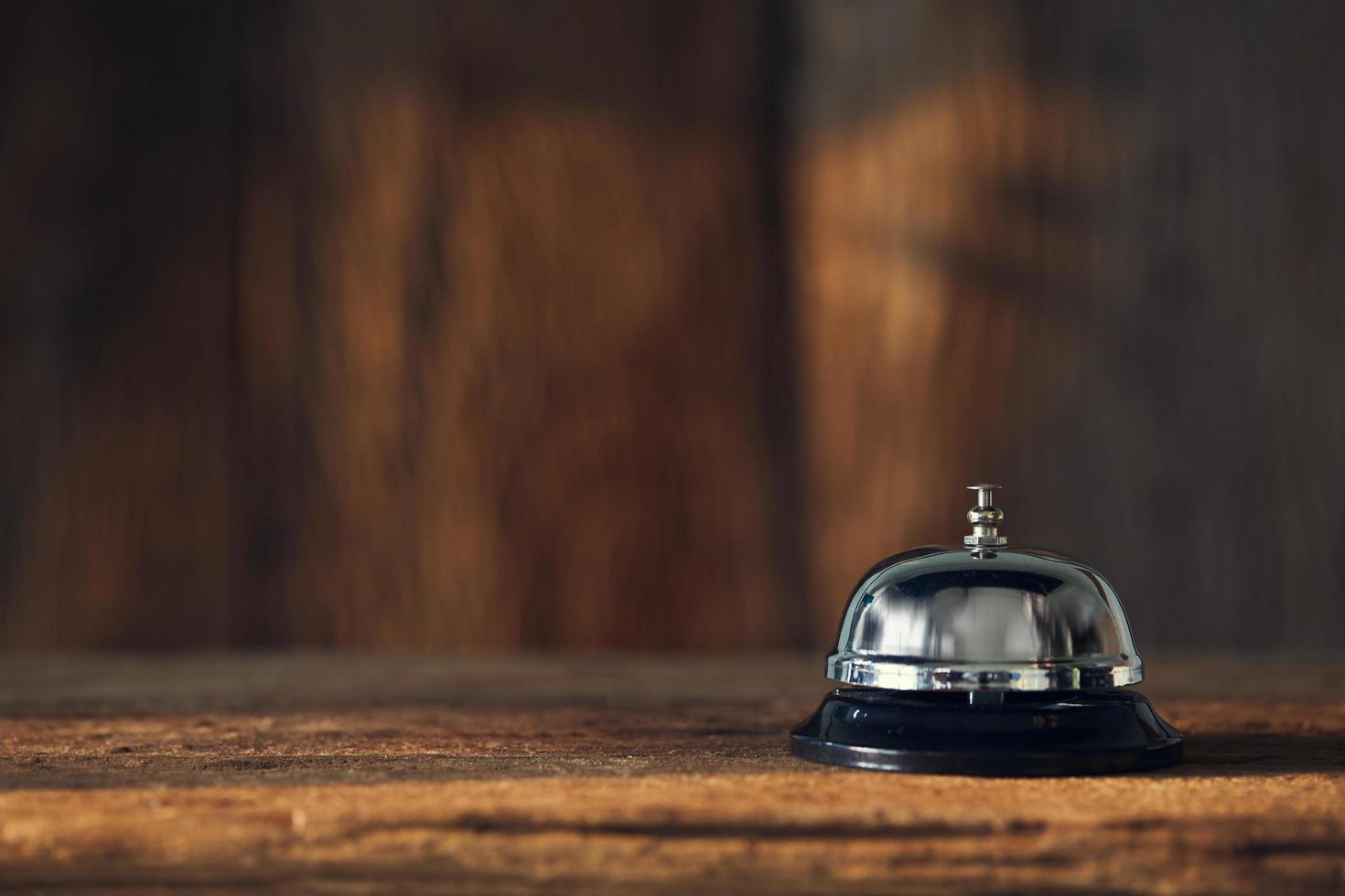 Service bell on wood photo