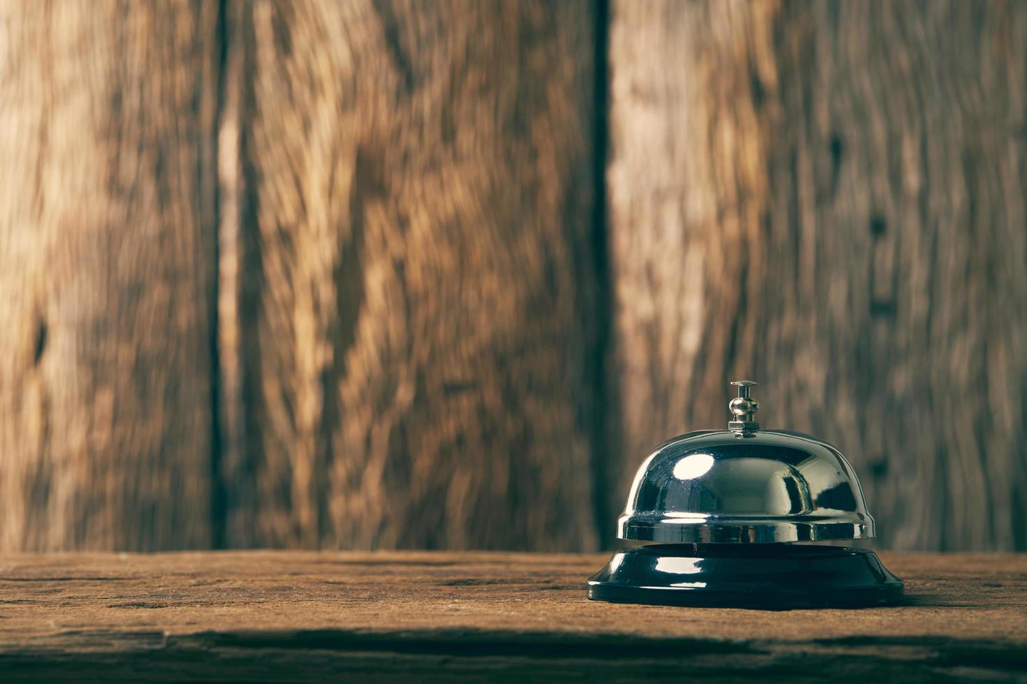 Service bell on rustic background photo