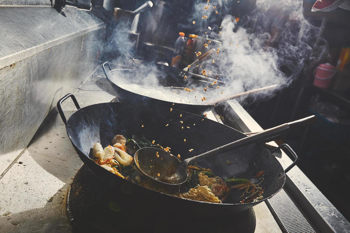 Cooking food in wok photo