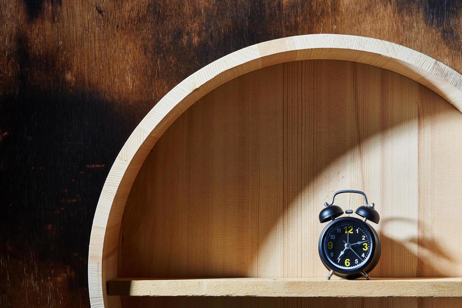 Clock on shelf photo