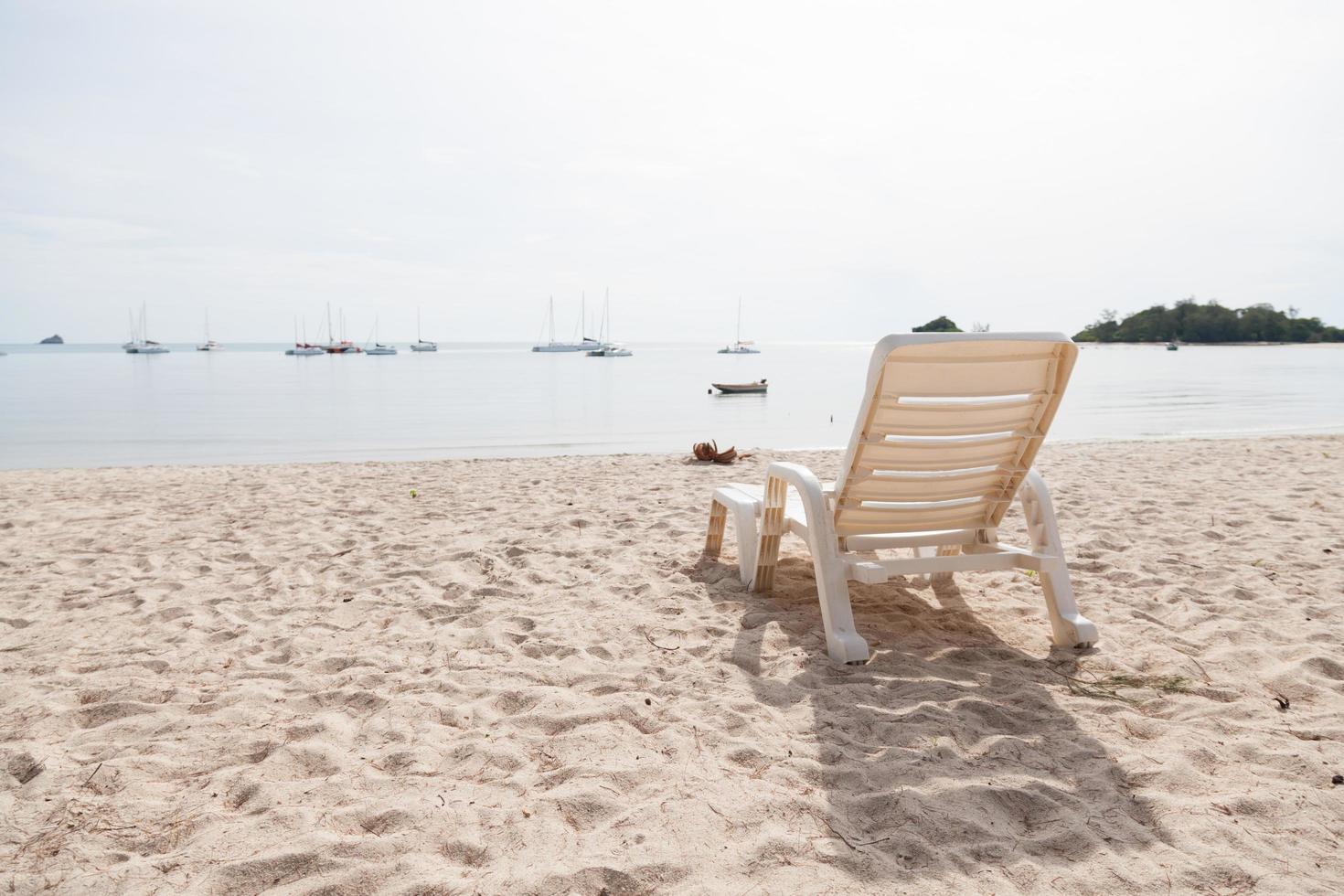 Sunbathing bed on the beach photo