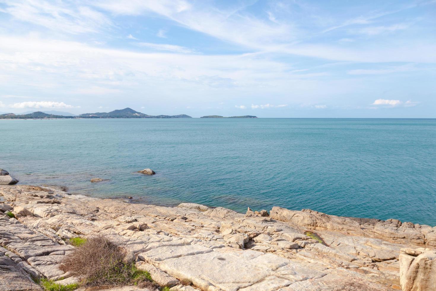 Rocky beach and sea in Thailand photo