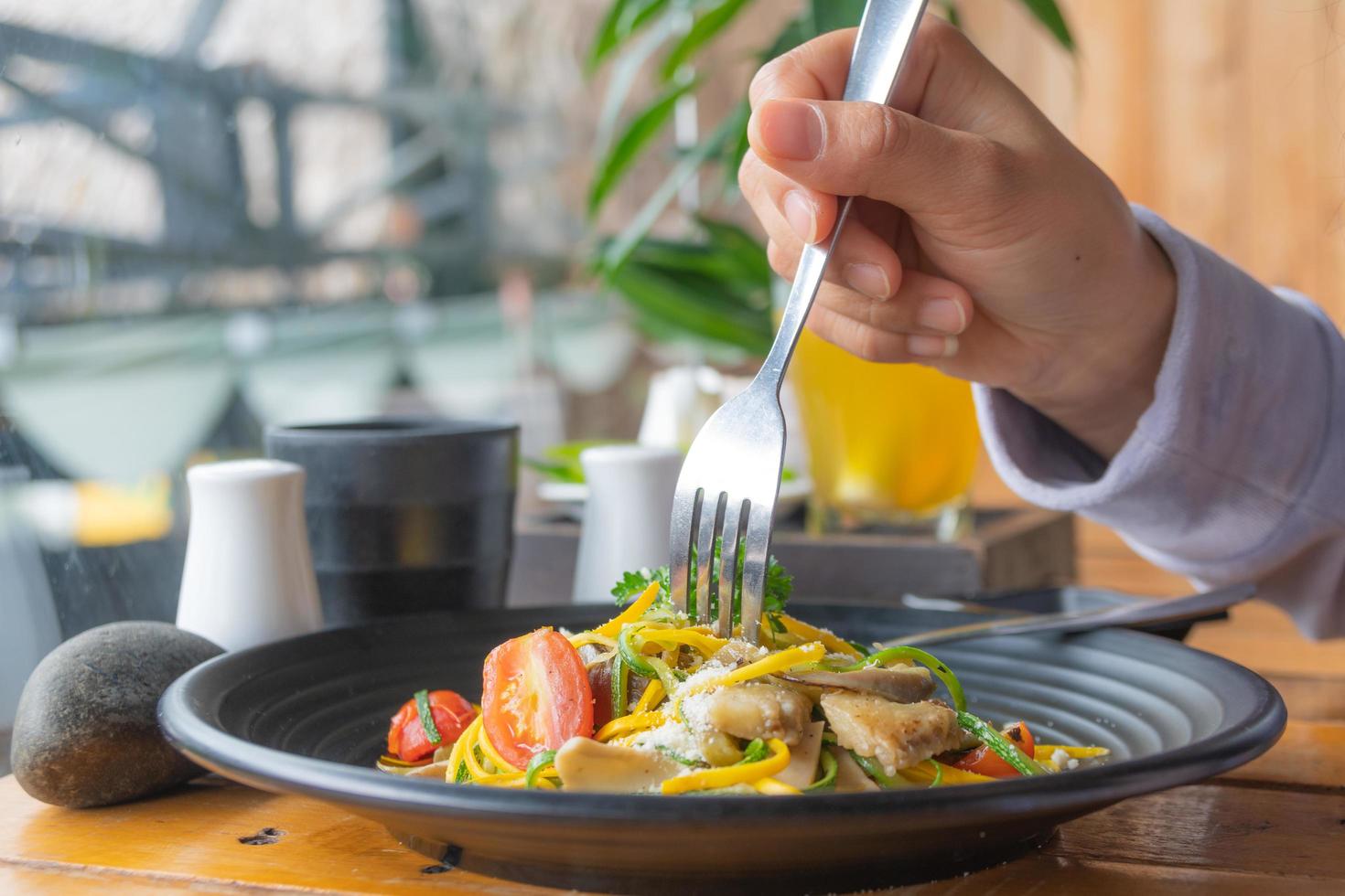 Eatting pasta with fork photo