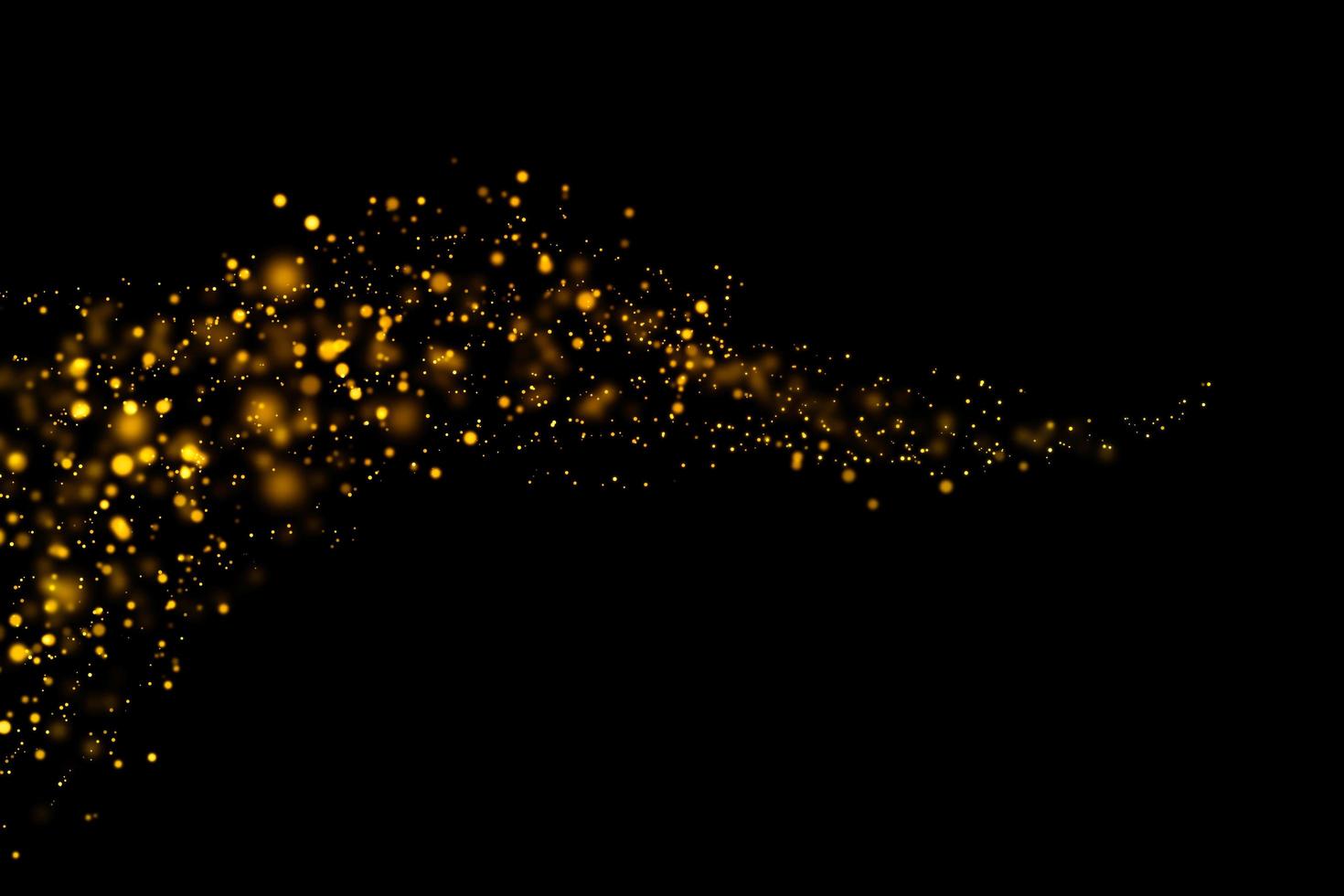 Blurred gold circles on black background photo