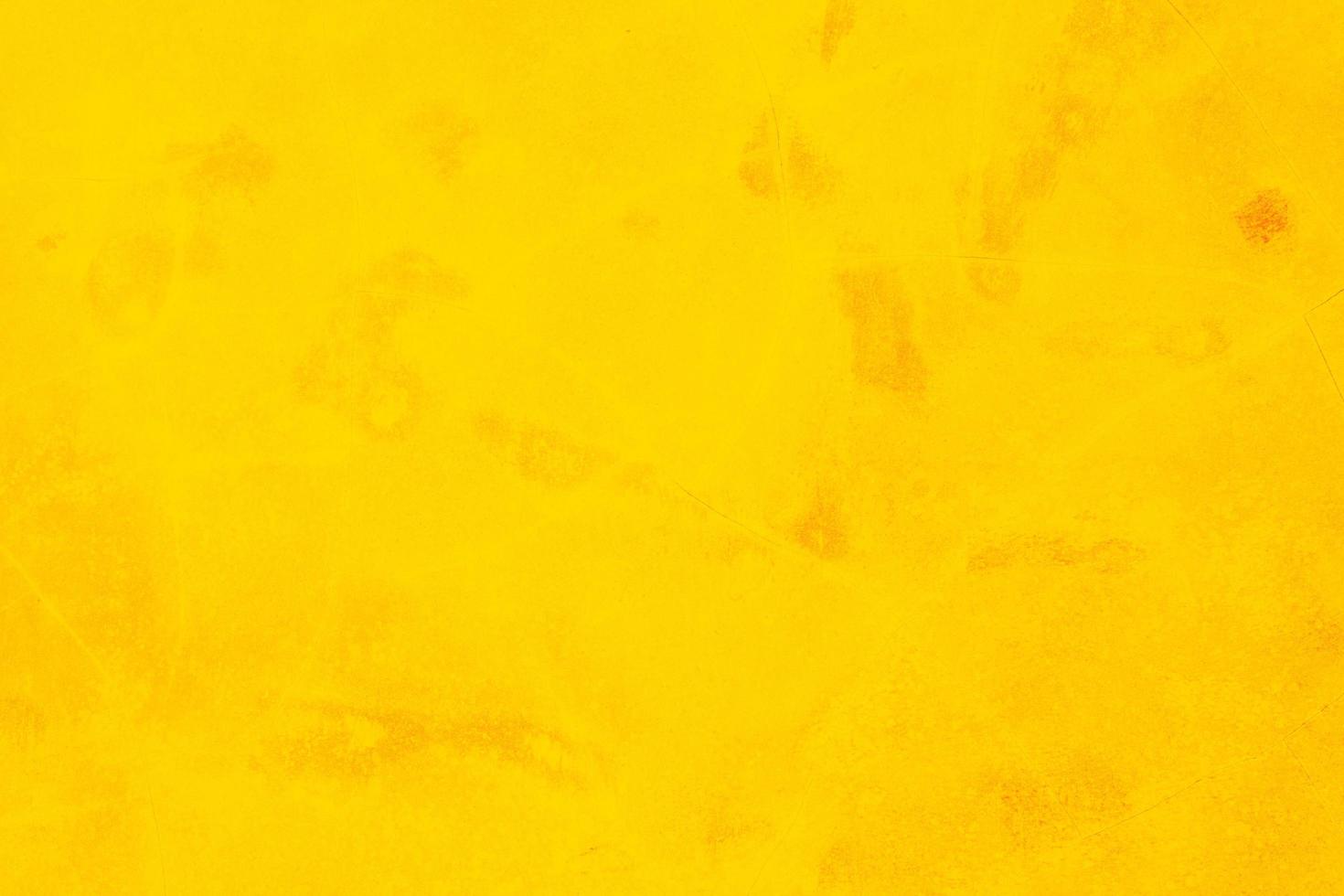 Muro de hormigón o cemento amarillo para textura o fondo foto