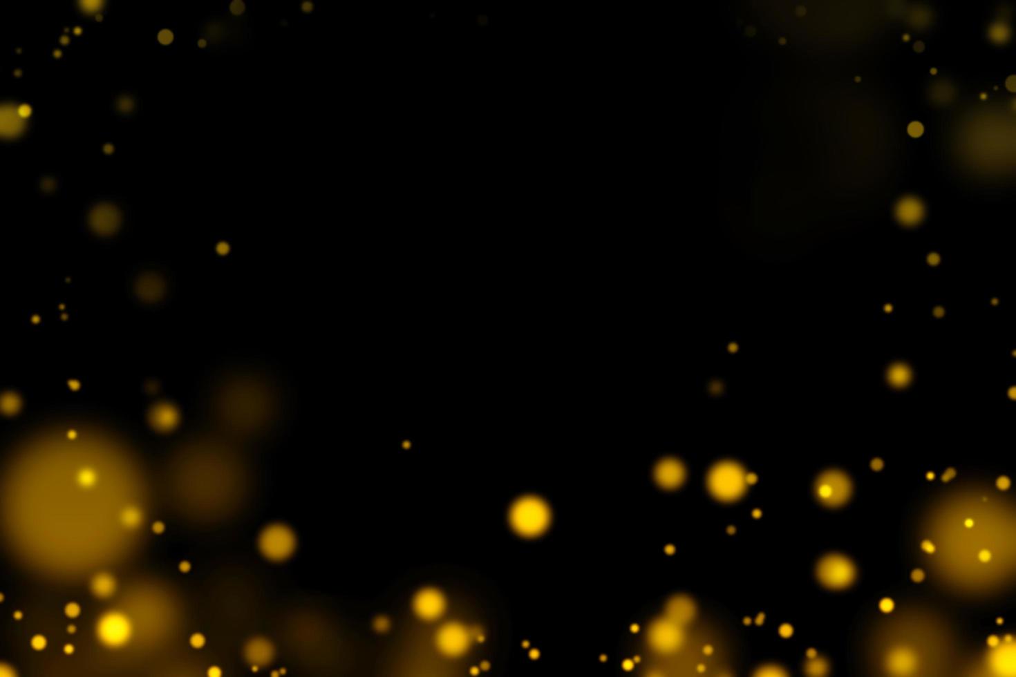 Blurred gold circles on black background photo