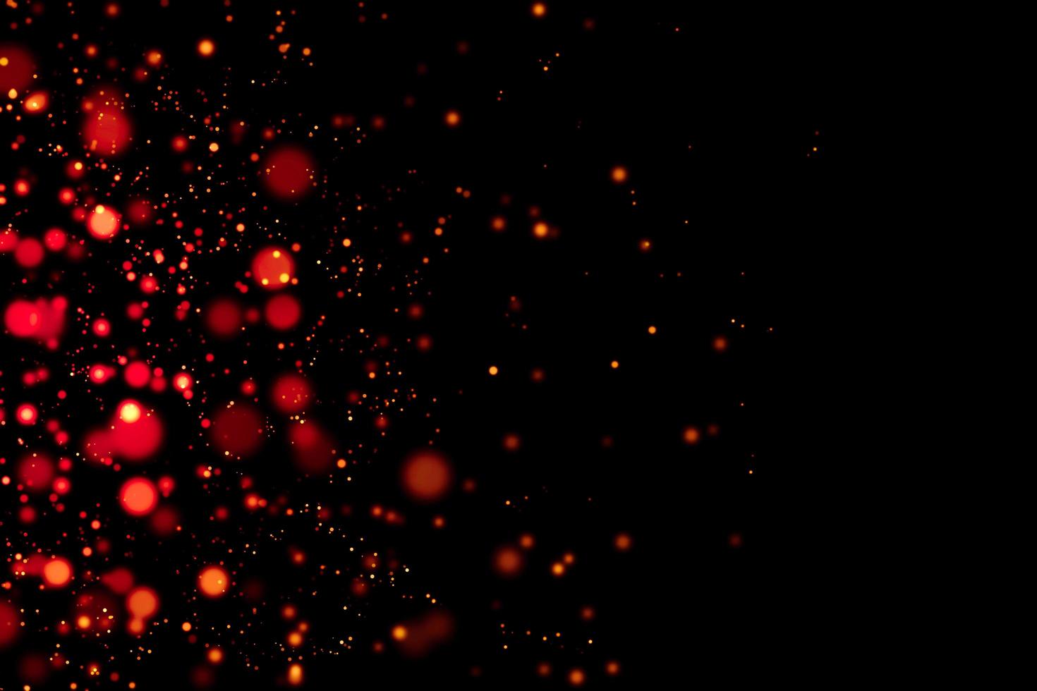 círculos rojos borrosos con fondo negro foto