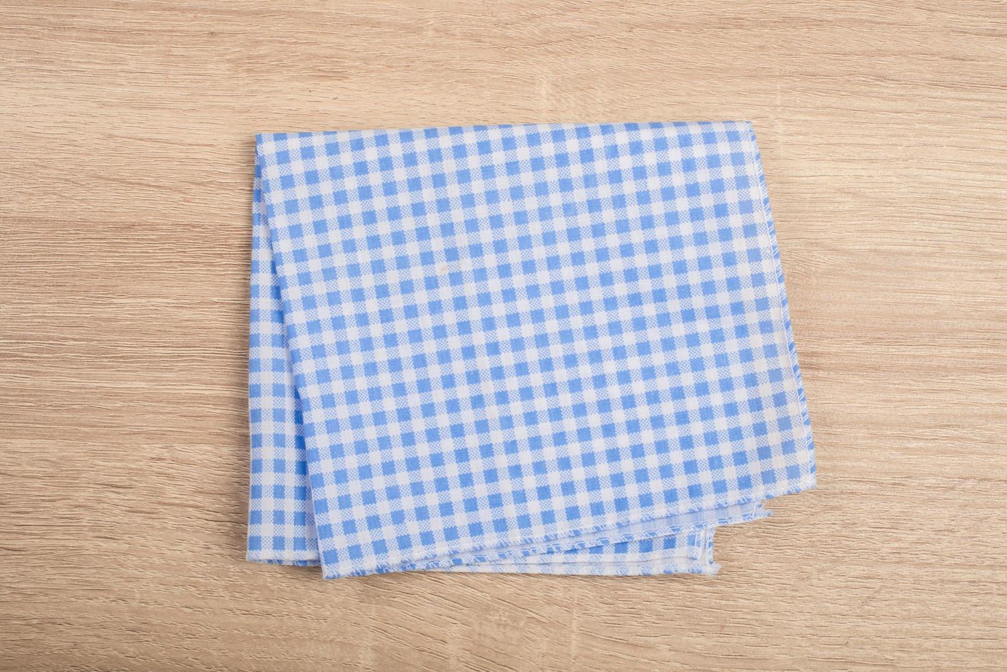 Blue table napkins isolated on white background photo