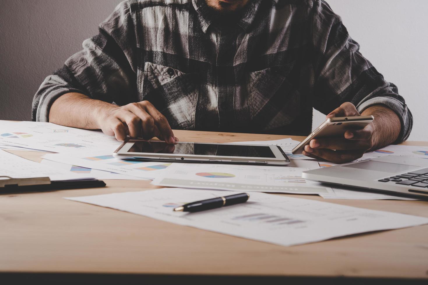 Businessman working with blank screen digital tablet photo