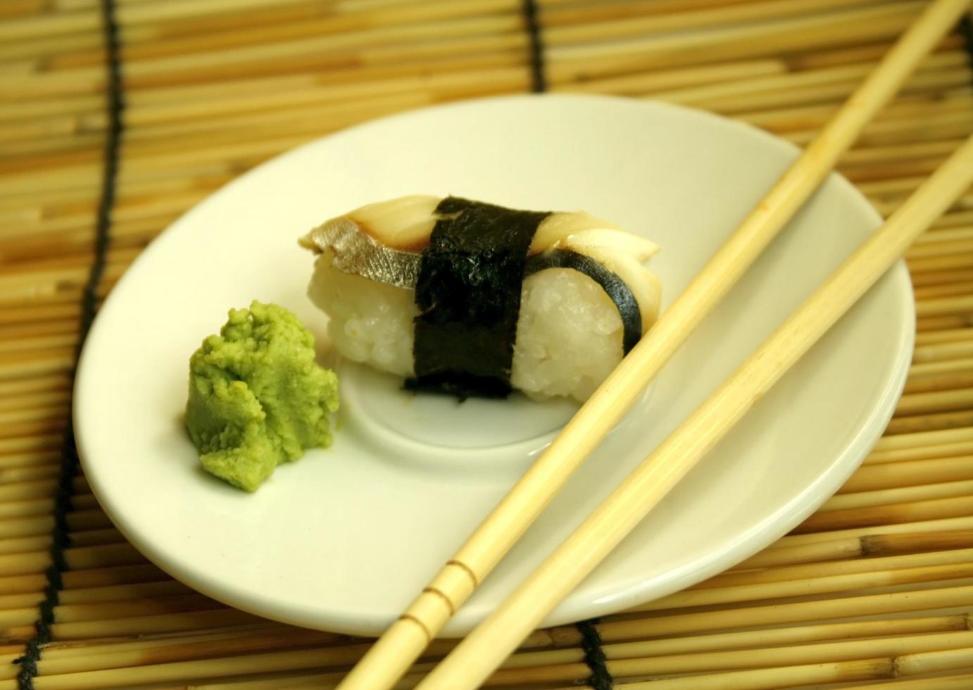 Sushi and chopsticks photo