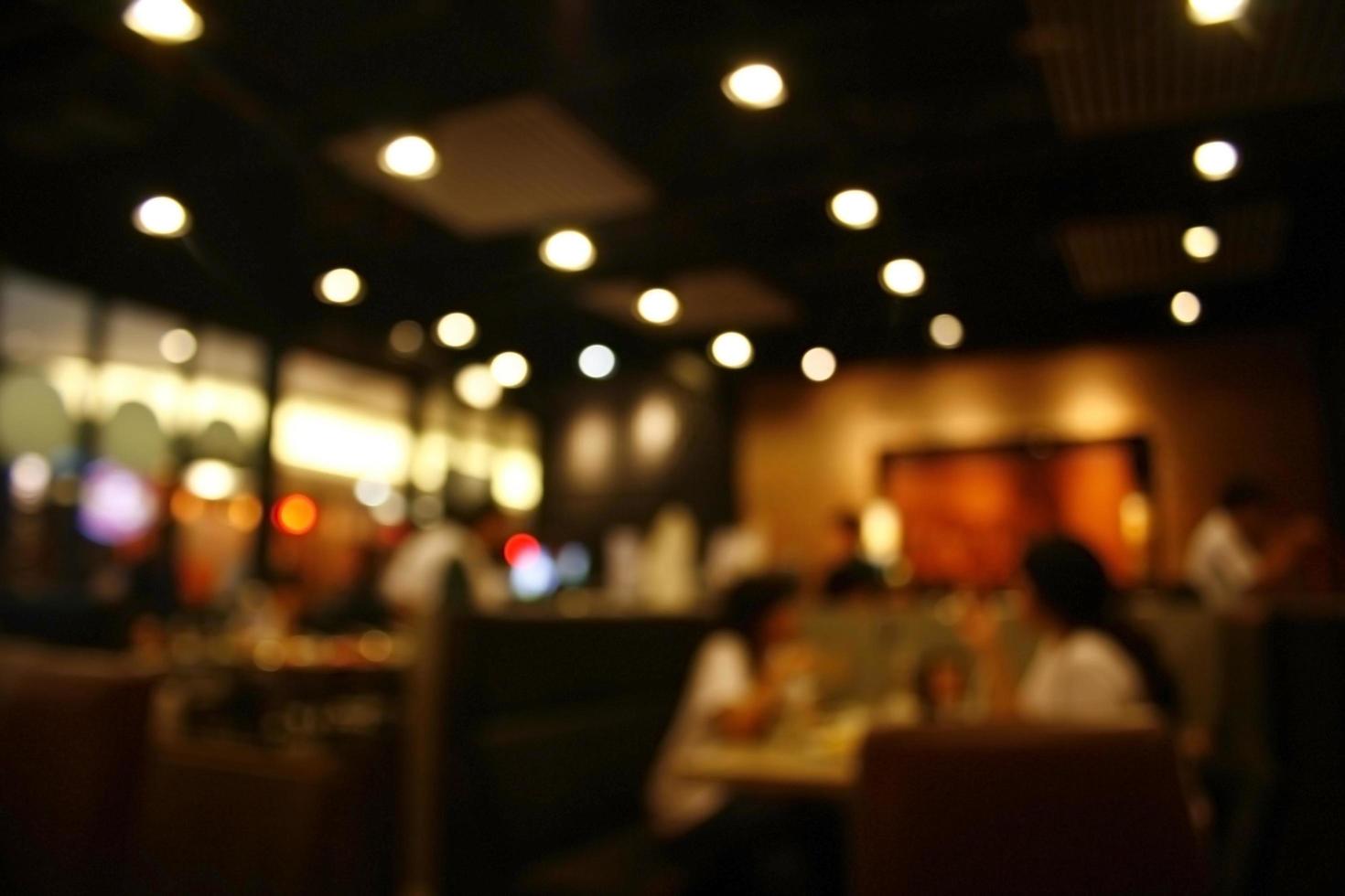 Blurred busy restaurant background photo