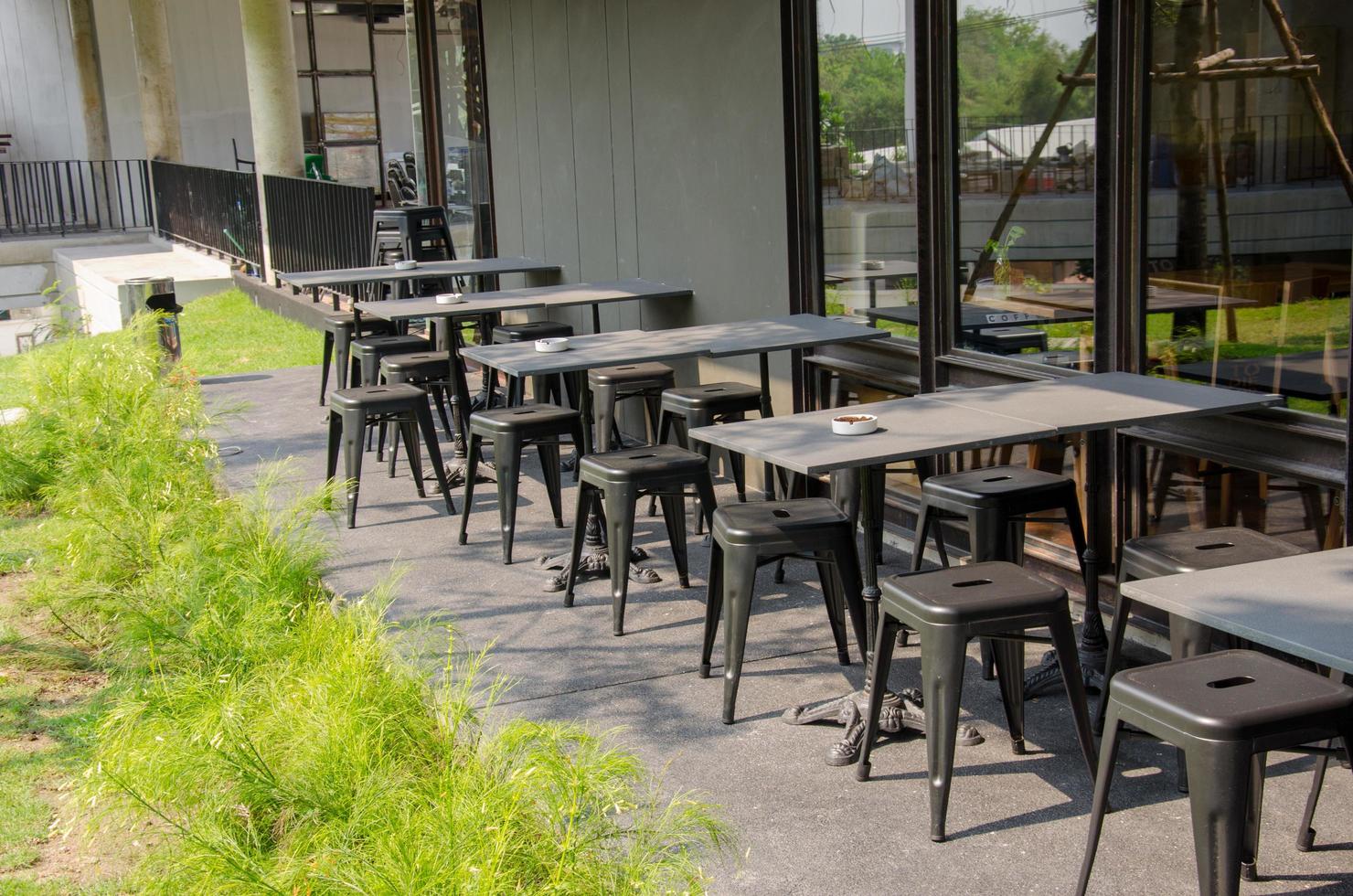 Chairs outside of a coffee shop photo