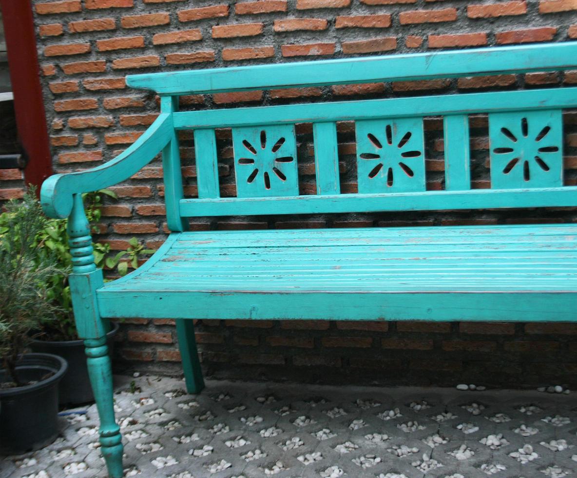 Turquoise bench outside photo