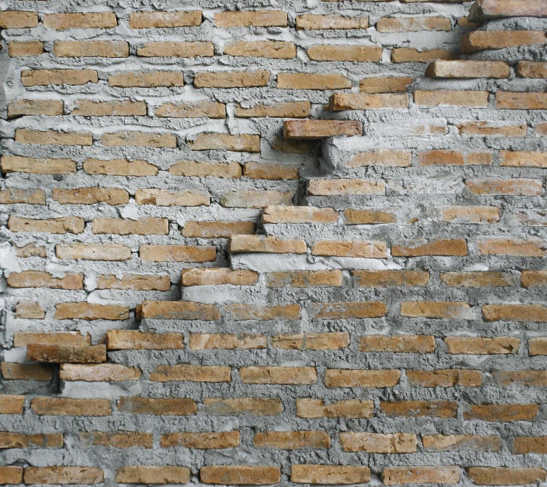 Old brick wall with crack photo