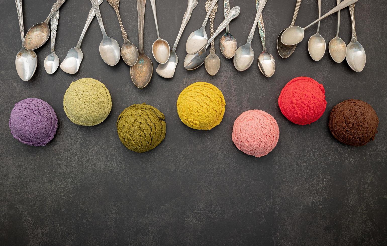 Spoons and ice cream scoops colorful photo