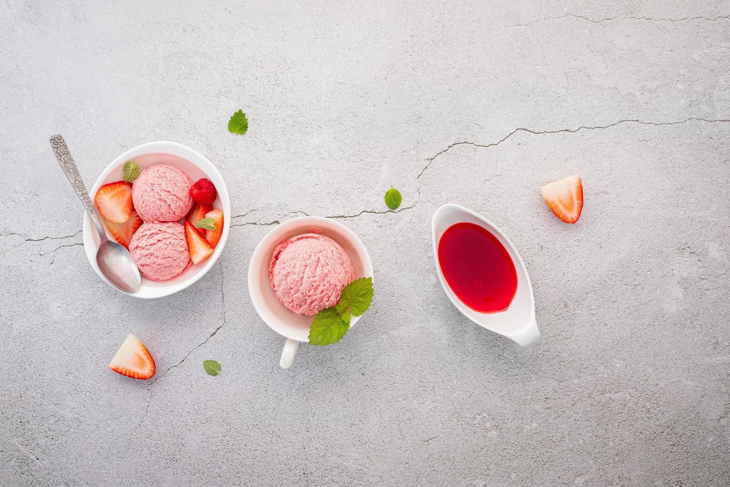 Strawberry ice cream flavour in white bowl photo