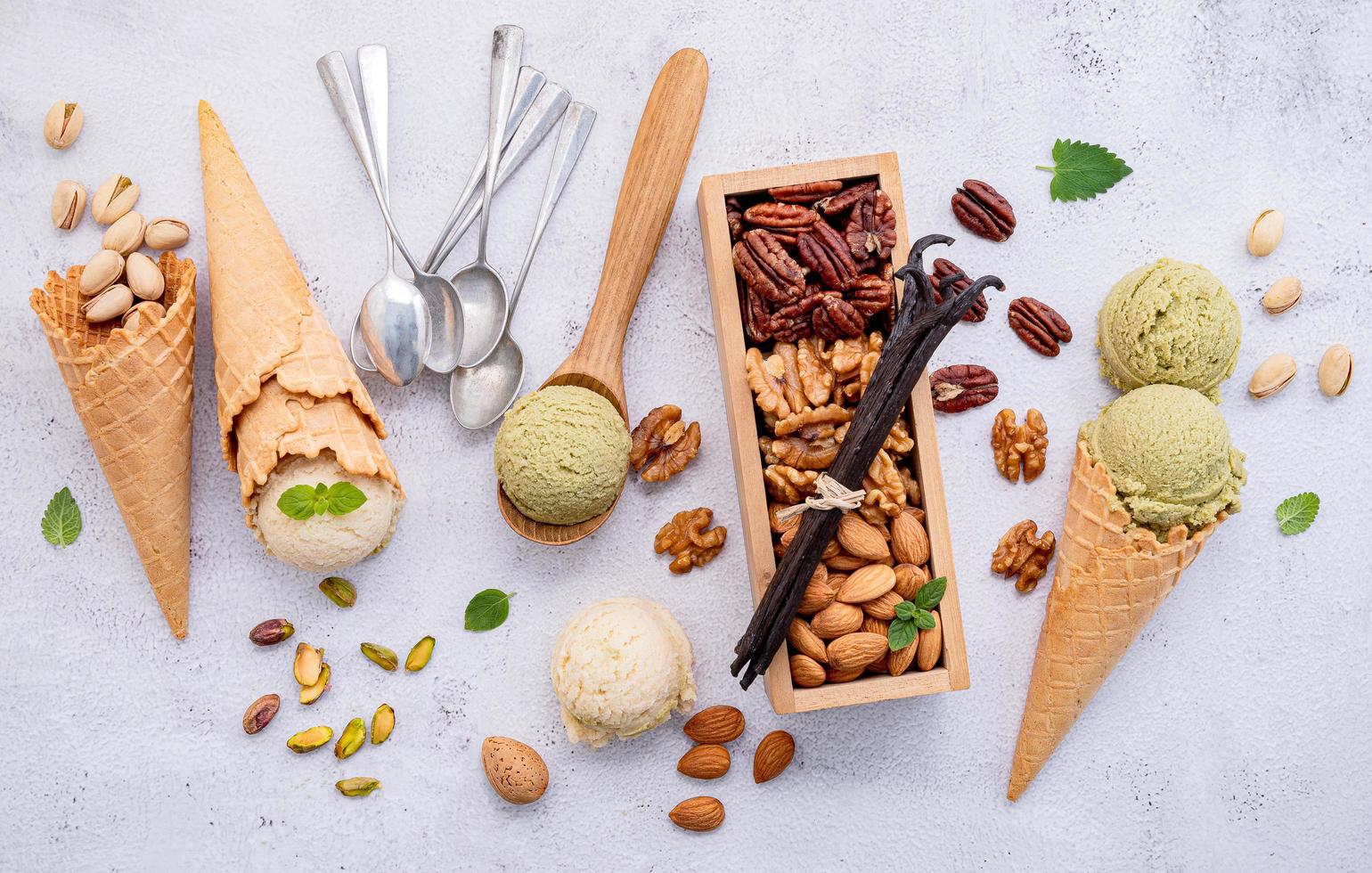 Pistachio and vanilla ice cream with mixed nuts photo