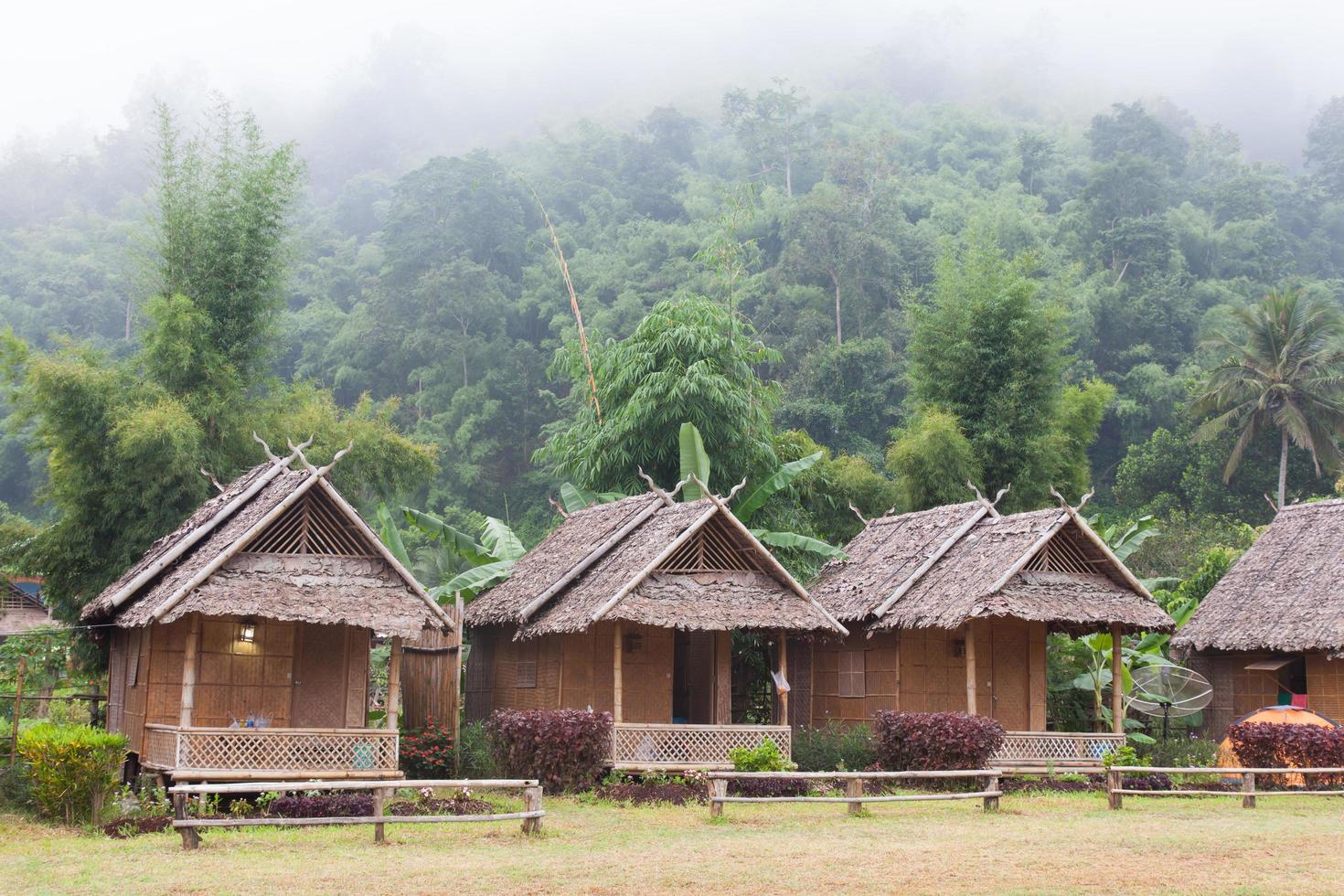 Huts at the forest in Thailand photo