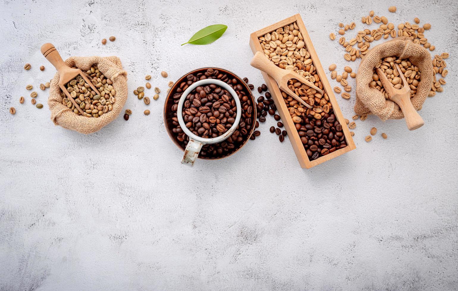 Roasted coffee beans with scoops photo