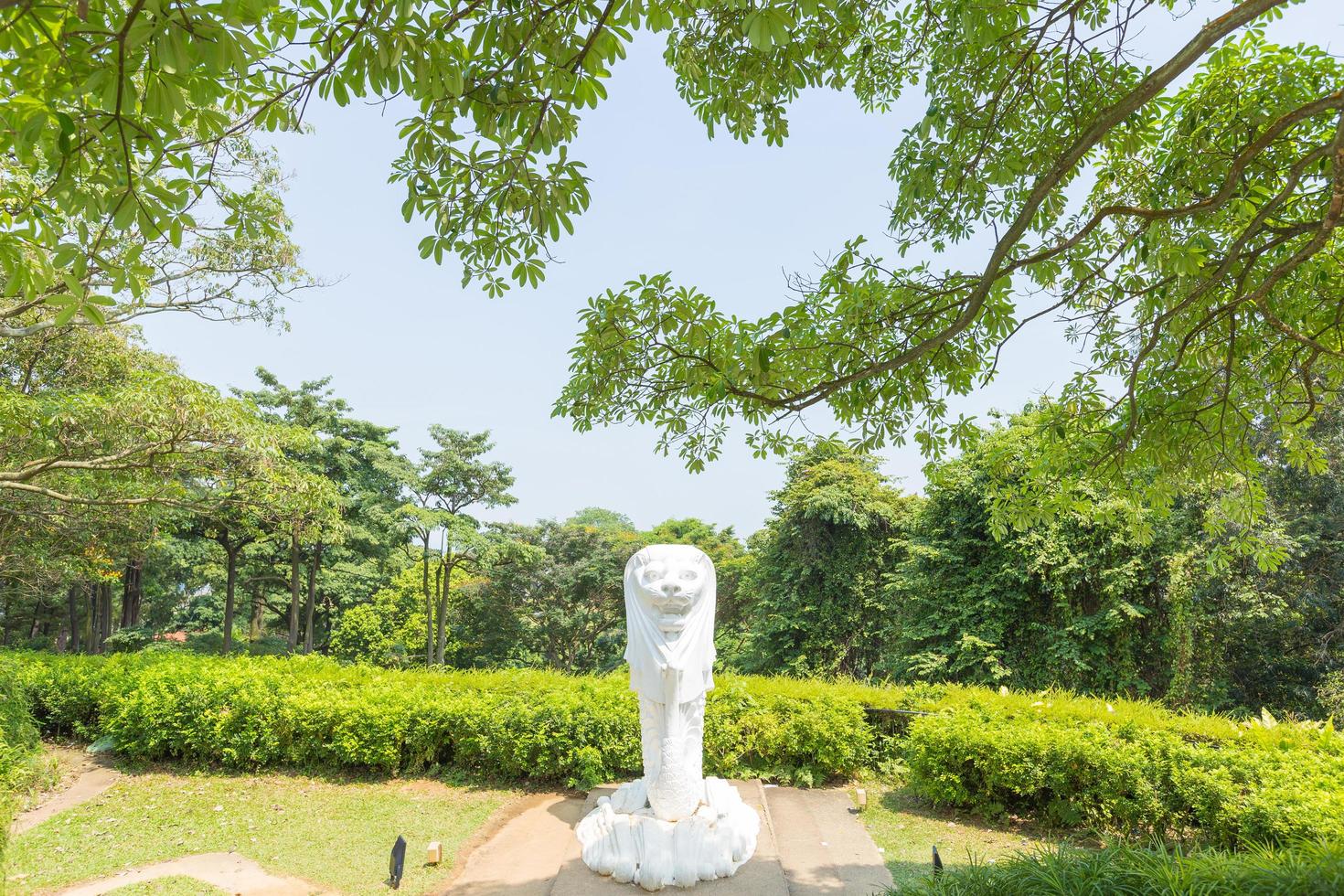 Merlion statue in a park in Singapore photo