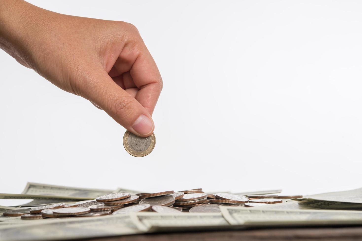 Coins on neutral background photo