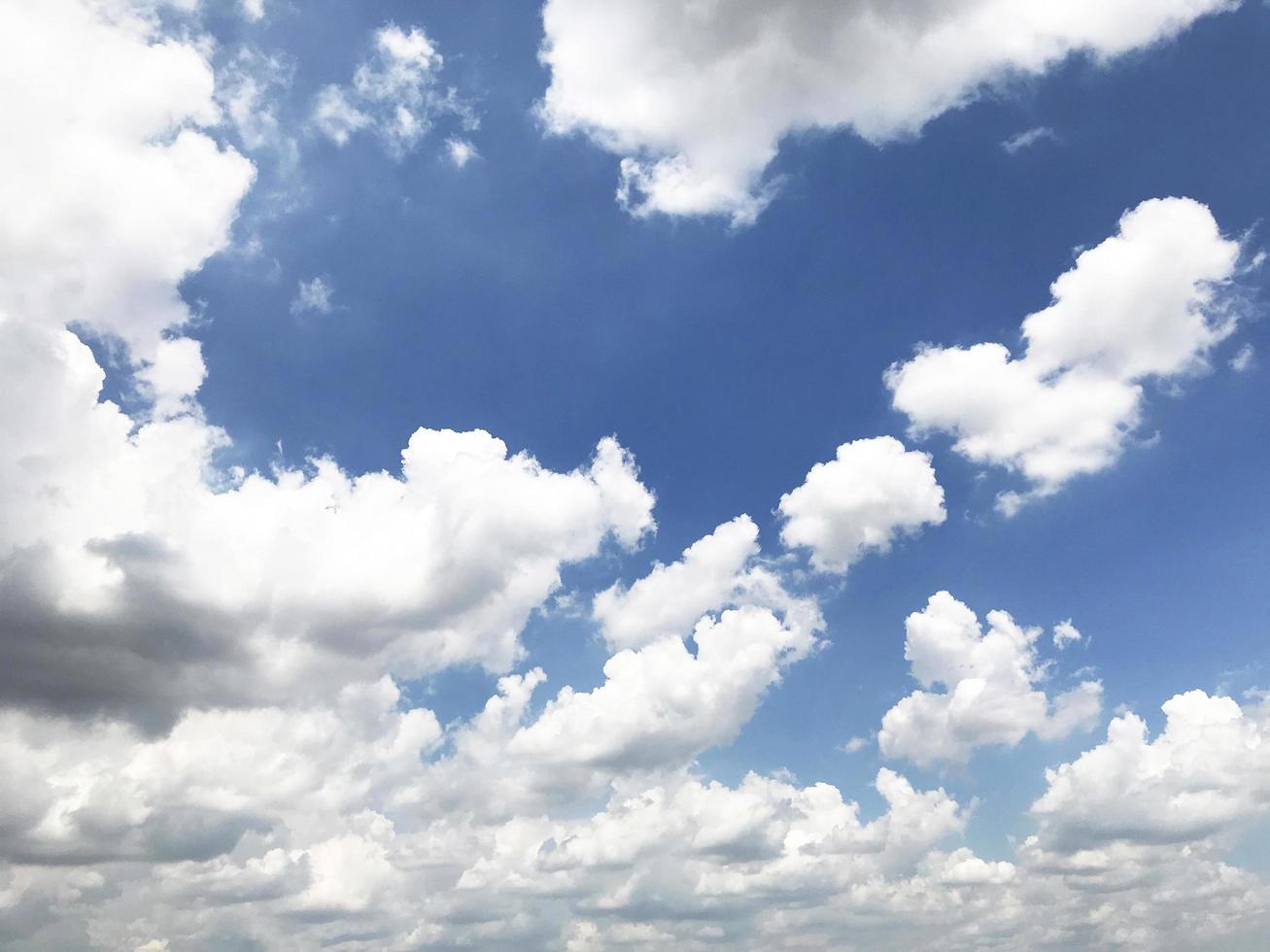 Fluffy white clouds photo