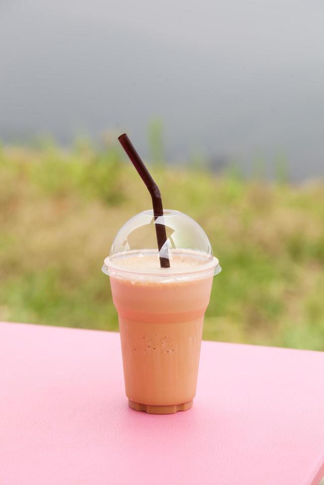 café en una taza de plástico foto