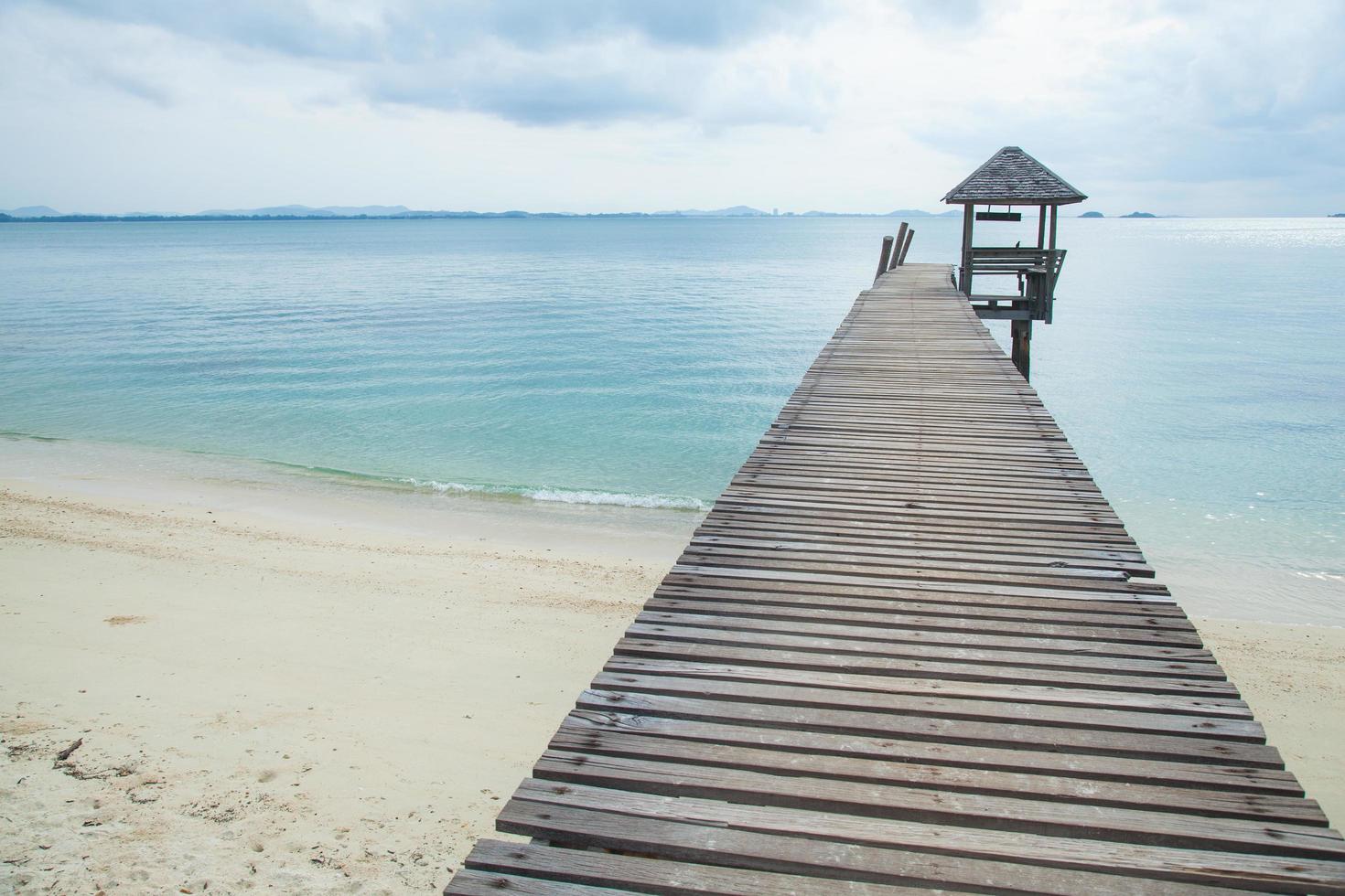 Wooden pier at the sea photo