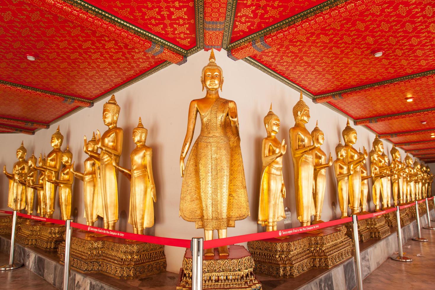 Buddha statues in a temple in Thailand photo