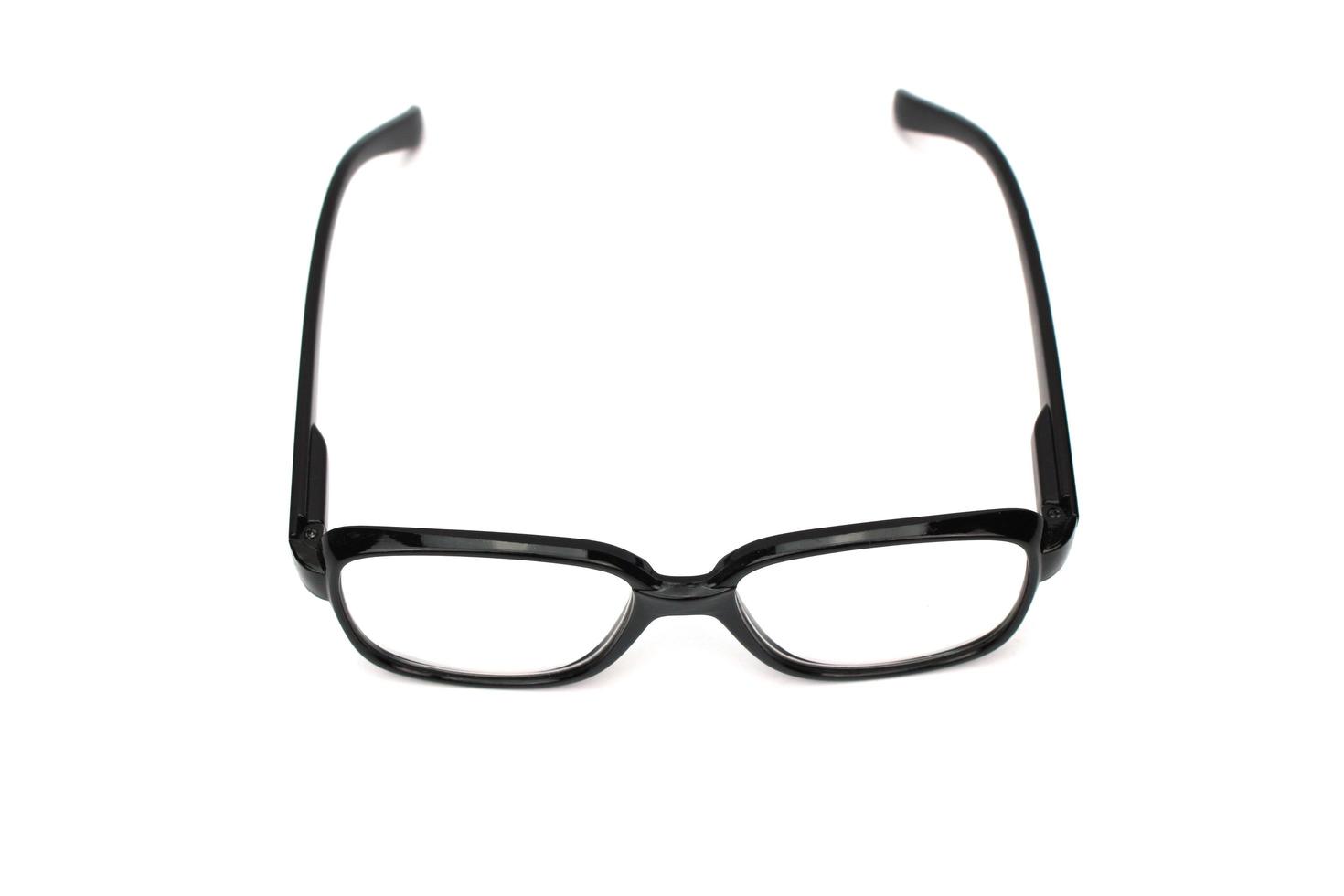 Black framed glasses on white background photo