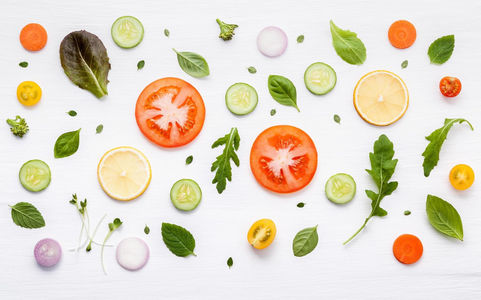 Food pattern with raw ingredients of salad photo