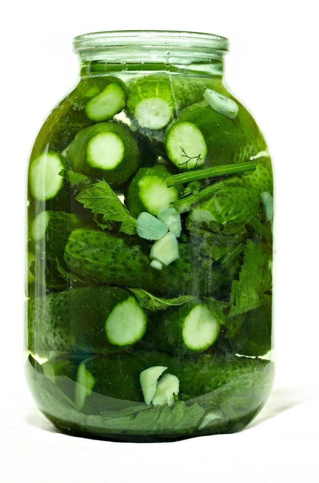 Jar of pickled cucumbers photo