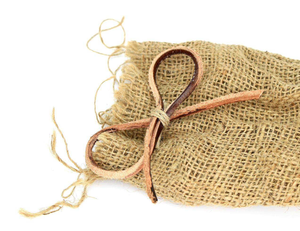 Burlap cloth and leather bow photo