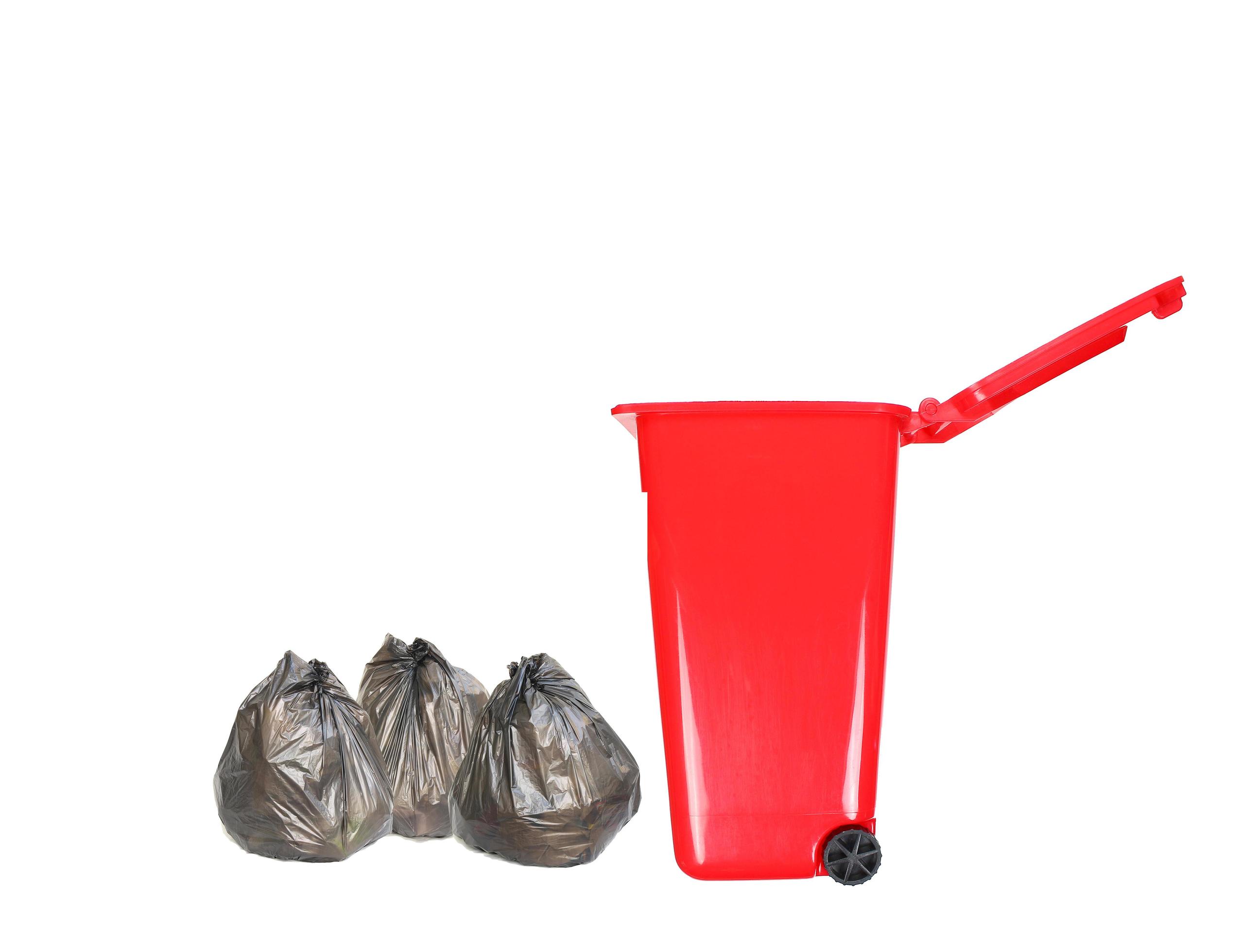 Red trash can and trash bags 1965225 Stock Photo at Vecteezy