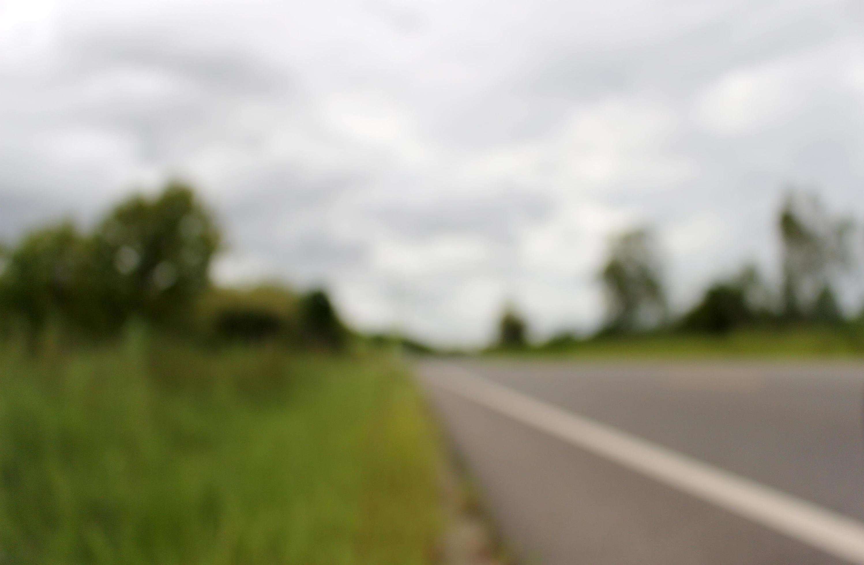 Blurry road background 1965263 Stock Photo at Vecteezy