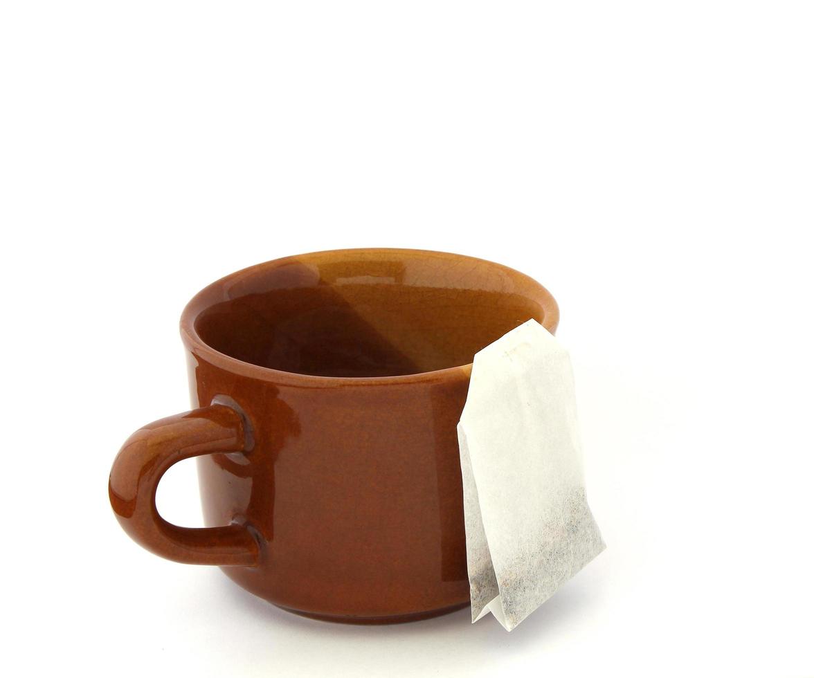 Brown cup and tea photo