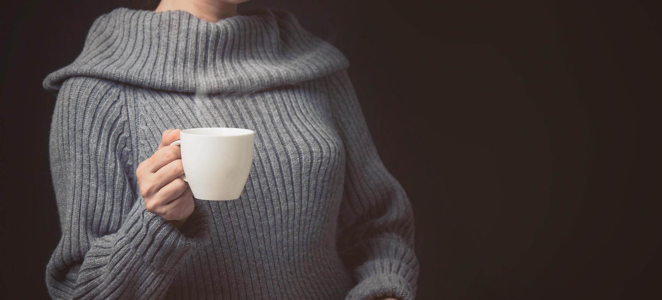 Woman holding a cup photo