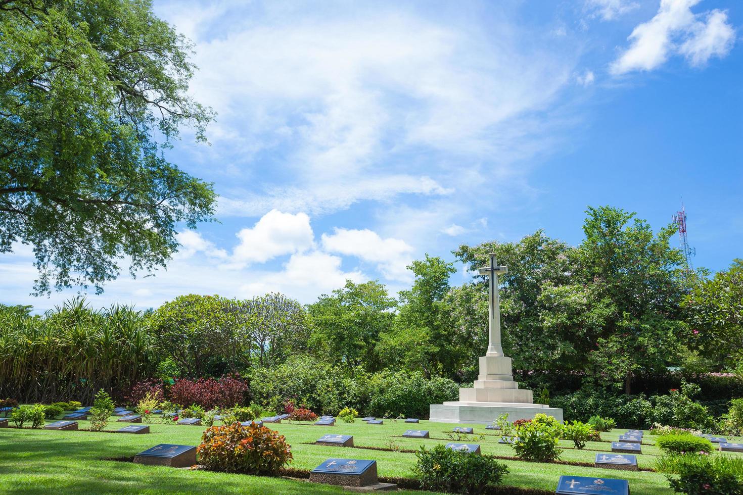 Cross in the cemetery in Thailand photo