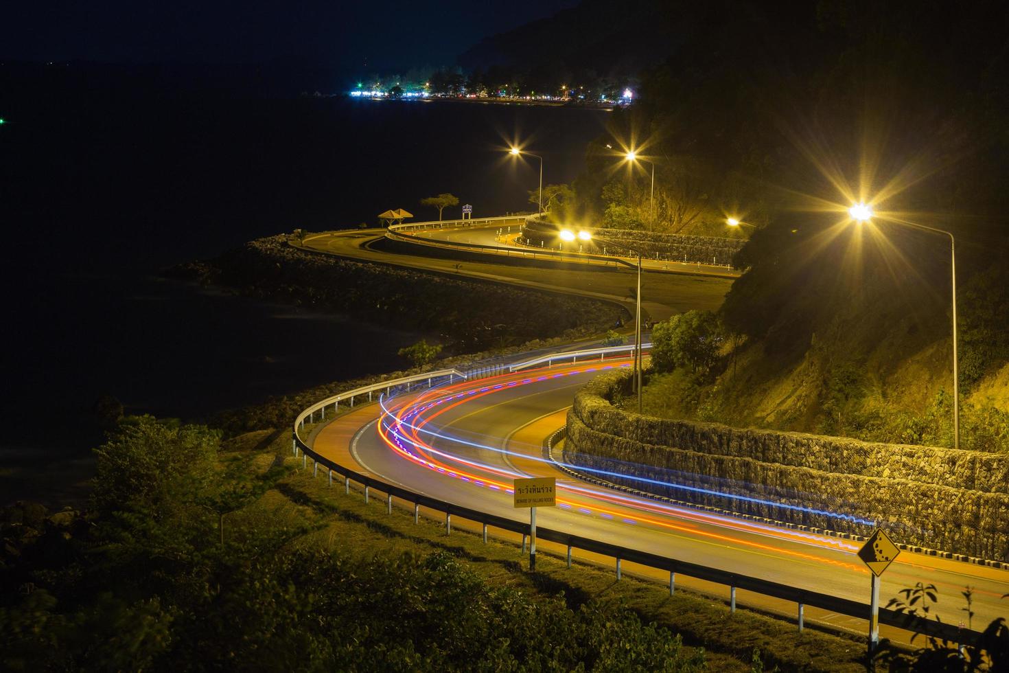 Curved road by the sea photo