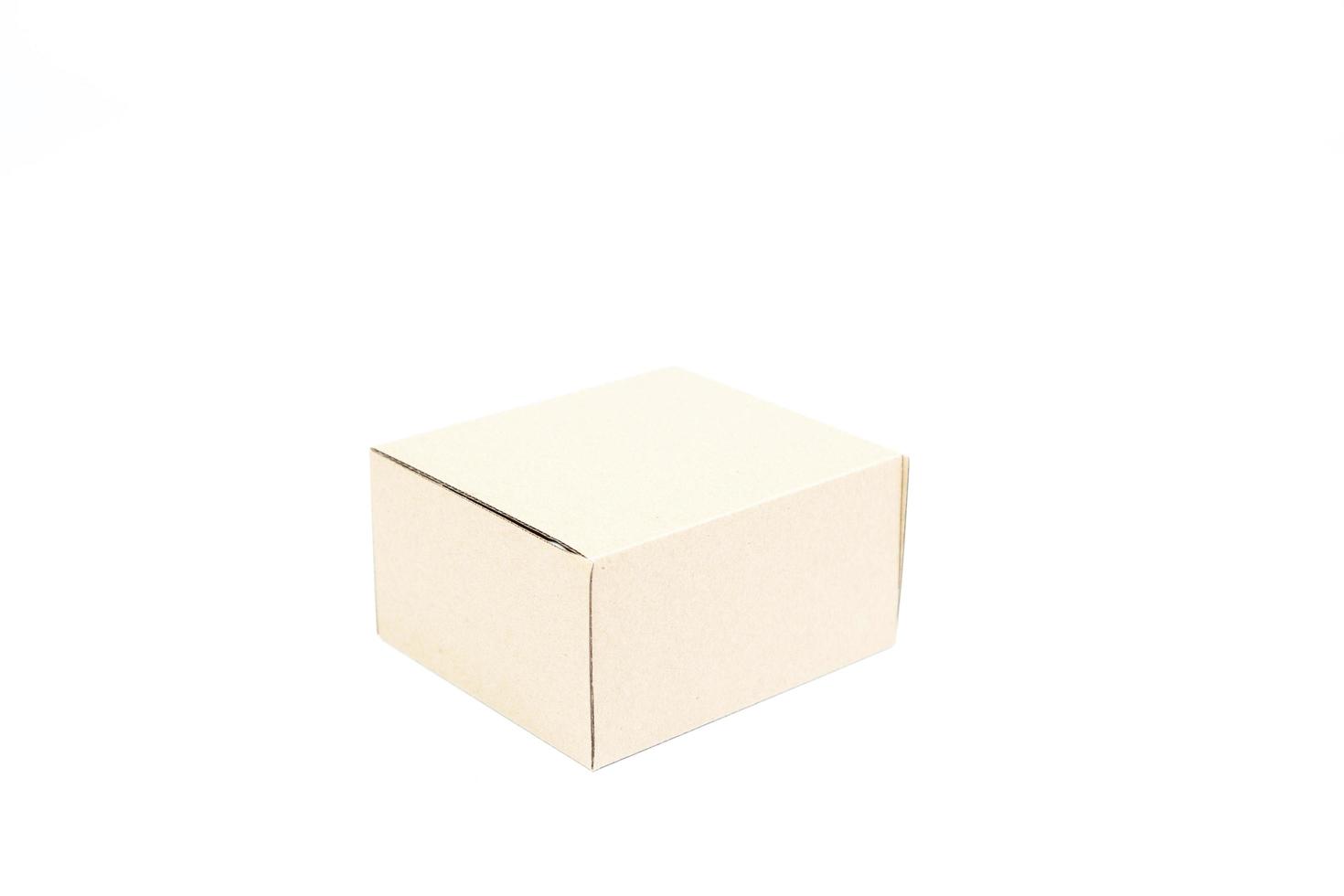 Beige paper box on white background photo